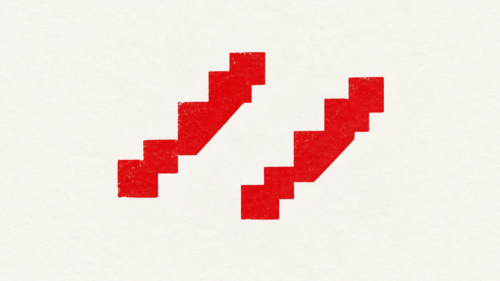 Two similar red stepped print impressions sit offset from each other on an off-white paper surface.