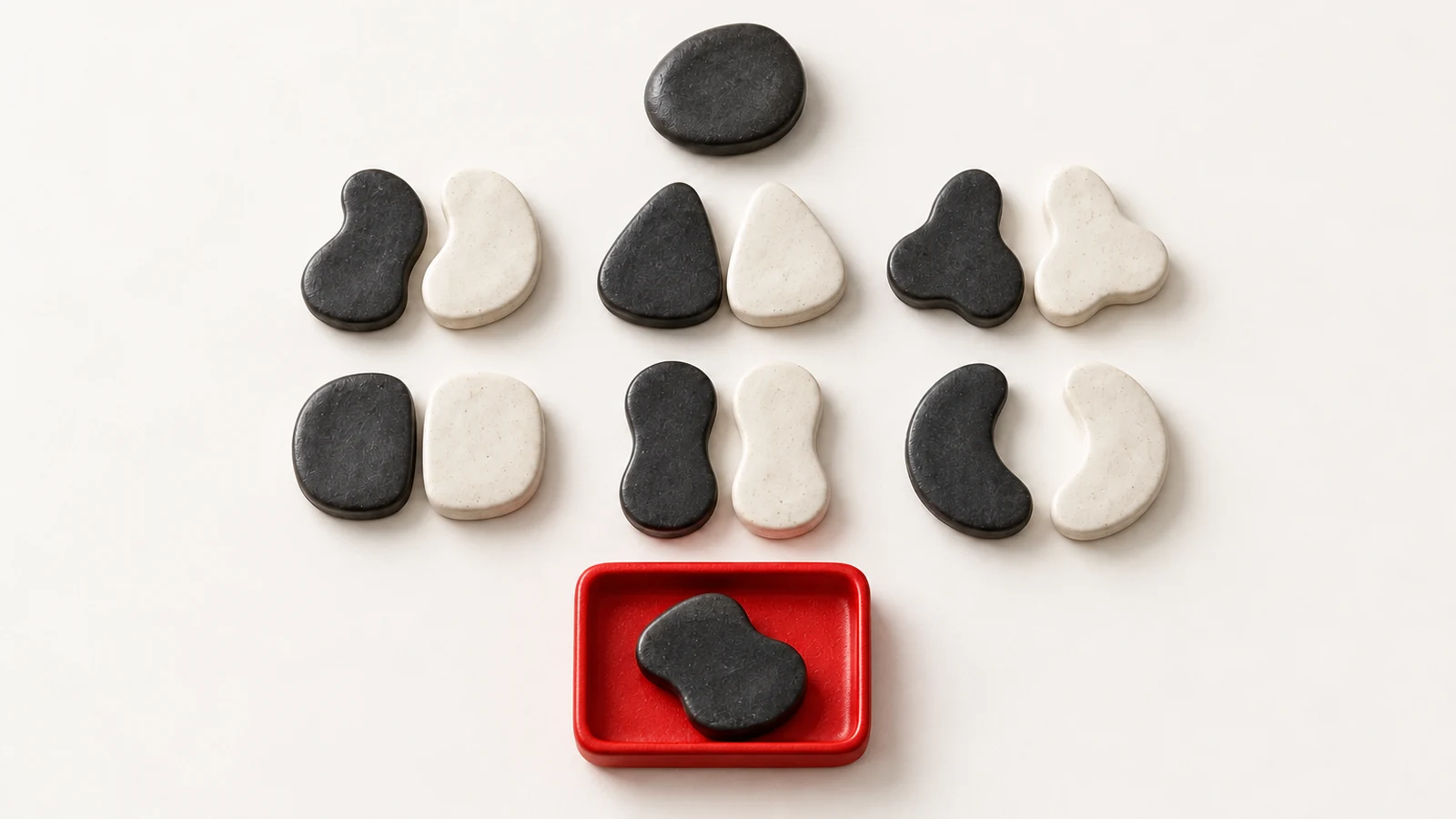 Six matched charcoal and off-white token pairs sit between a reference token and a red review tray holding one unmatched token.